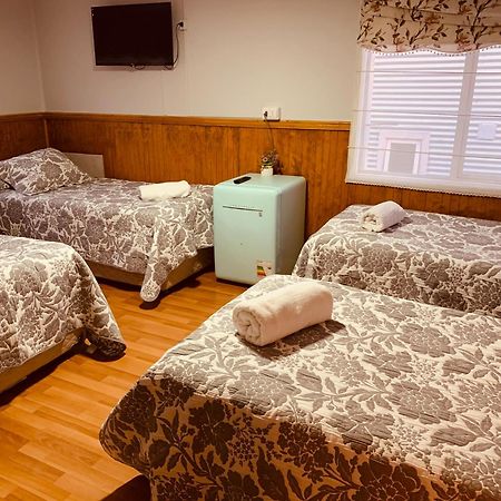 Arte Brisa Hostal Boutique Пуэрто-Наталес Экстерьер фото
